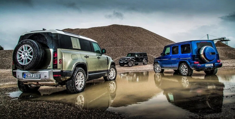 Land Rover Defender vs Jeep Wrangler vs Mercedes G-Class group test review (1) Land Rover Defender vs Jeep Wrangler vs Mercedes G-Class group test review (1)